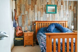 Bedroom One- click for photo gallery
